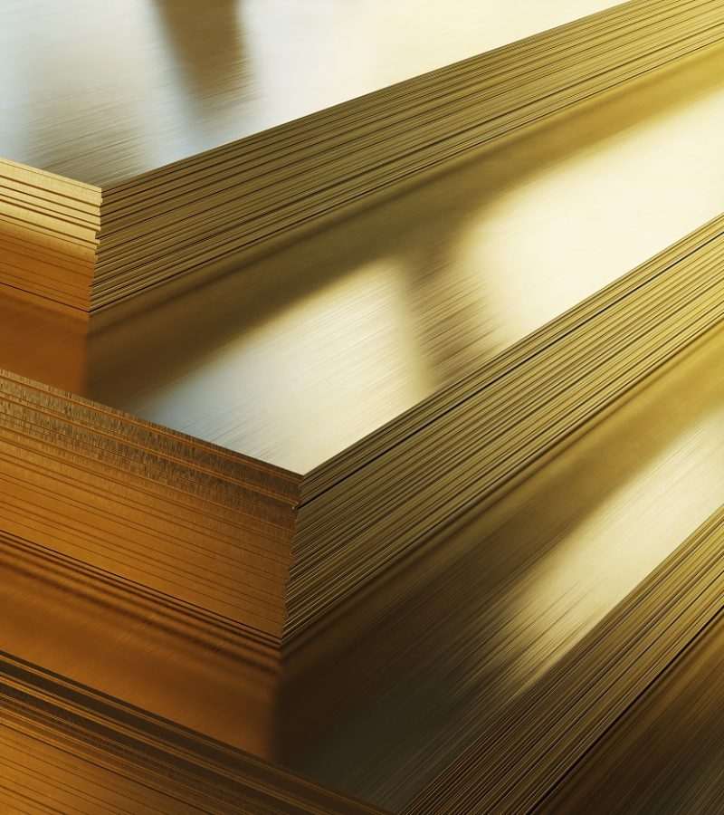 Brass sheets. Rolled metal product, close-up. 3d illustration.