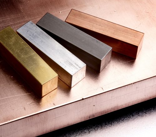 copper, gold, steel and aluminum shot of copper bar