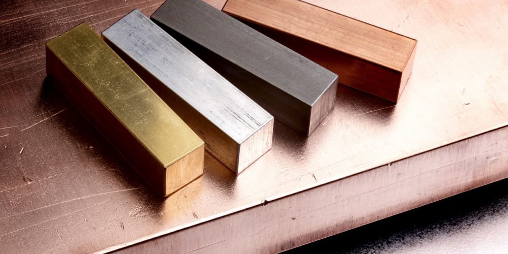 copper, gold, steel and aluminum shot of copper bar